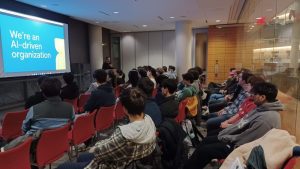 Students gather at the Wisconsin Institute for Discovery to here from Google's Christopher Mende. 